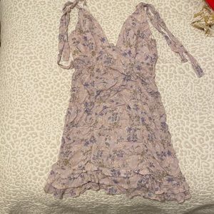 Worn once. Purple floral beginning boutique dress